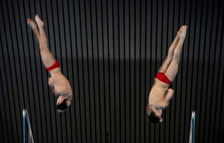 tom jenkins diving: The Ukrainian team of Olexsandr Bondar and Maxym Dolgov 