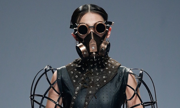 A model walks the runway wearing designs the at the Zhejiang University of Science and Technology School of Apparel Design Graduates Show.