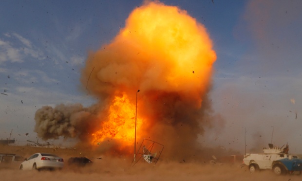 An explosion is seen during a car bomb attack at a Shi'ite political organisation's rally in Baghdad.