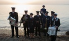 The New Zealand Defence Force band on the beach of Anzac Cove.