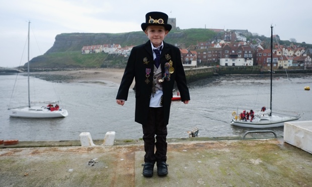 Young steampunk Robin Middlehurst, 8, from Cheshire shivers on the shore ~ Getty Photograph by Ian Forsyth