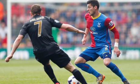 Manchester City's James Milner and Crystal Palace's Joel Ward in action.
