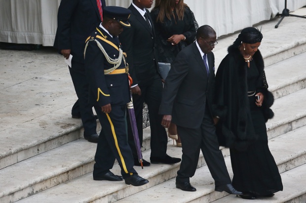 Robert Mugabe, President of Zimbabwe, and his wife Grace Mugabe attend.
