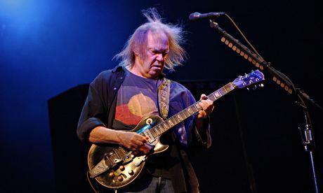 Canadian singer Neil Young performs at the Glastonbury Festival 2009 in south west England