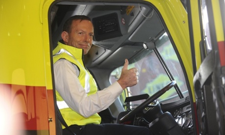 Tony Abbott tries out the driver's seat during a 2013 visit to Linfox in Melbourne.