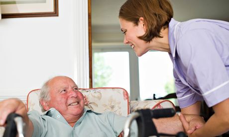 Care Giver at Home of Elderly Man