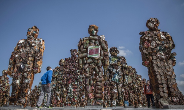 Young Israeli boys look at the Trash People exhibition by German conceptual artist HA Schult in Ariel Sharon Park, Israel.