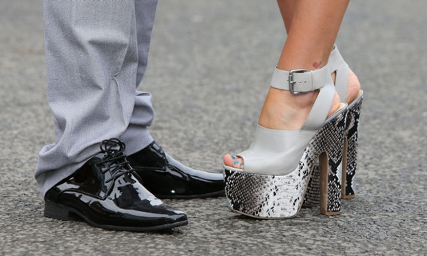 Racegoers in shoes meant for talking, not walking.