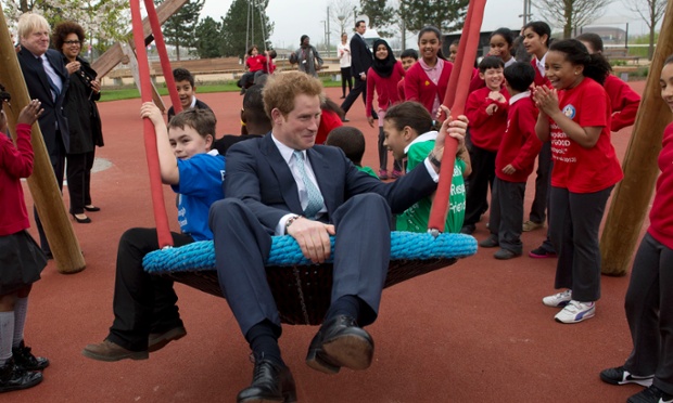 Prince Harry enjoys exploring a new playground with children from Gainsborough Primary school in Newham during an official visit to Queen Elizabeth Olympic Park with the Mayor of London, Boris Johnson. 