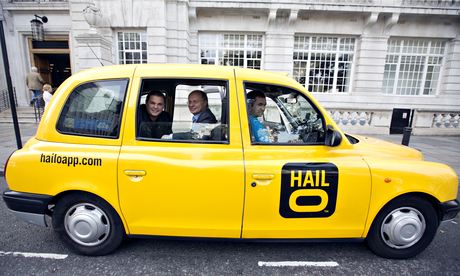 Gary Jackson, left, and Ron Zeghibe, co-founders of Hailo, in a London taxi cab. 