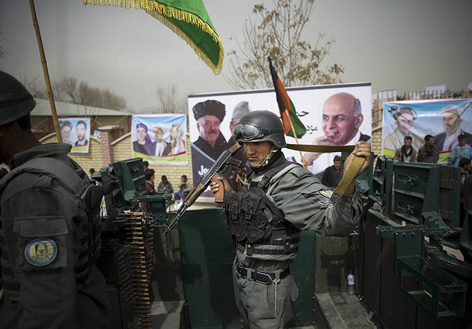 20 Photos: Policemen secure the area as Afghan presidential candidate Ashraf Ghani Ahmadza arrives
