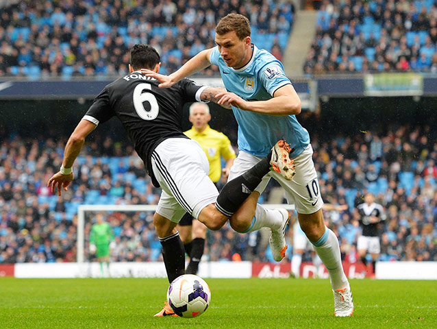 City v soton: Jose Fonte fouls Edin Dzeko