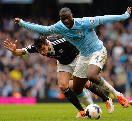 City versus Soton: Yaya Toure uses his strength to surge past Jose Fonte