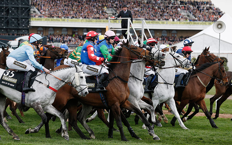 aintree day 3: The horses break through the tape for a false start