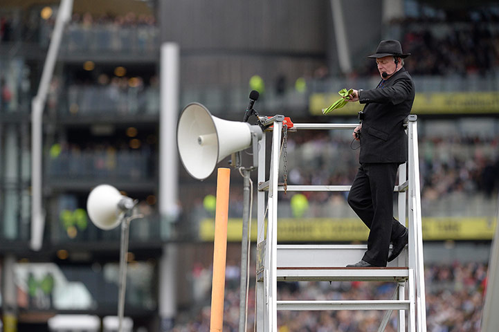 aintree day 3: The starter gets ready to wave his flag