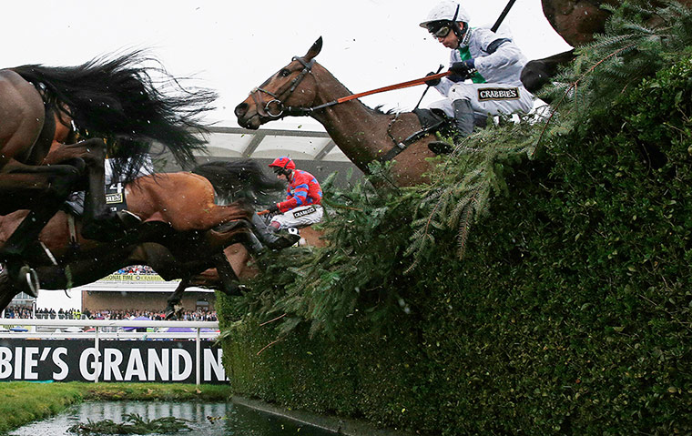 aintree day 3: Pineau De Re goes over the Water Jump 