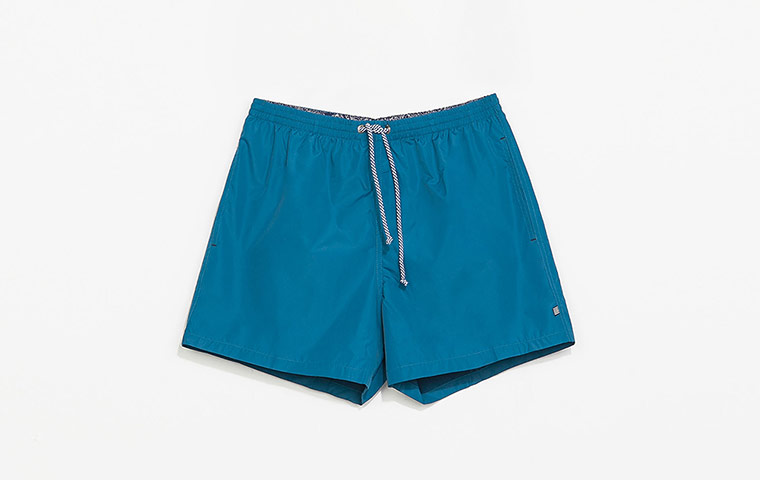How to wear: Beach: Blue swimming trunks