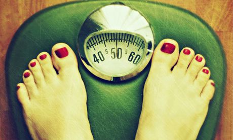 Feet on weighing scales