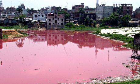 Tannery factory waste turns water red 