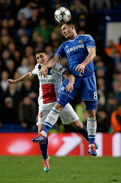 Chelsea v PSG: Frank Lamapard outjumps Marco Verratti