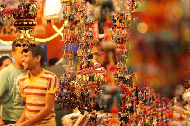 'Clicked this sometime back in Jaipur. The colors of an Indian market place is where you get the real flavor of our country. The happiness of a simple shopkeeper reflects well in the backdrop. Let's keep these smiles intact. Let's vote and make India a better democracy!'