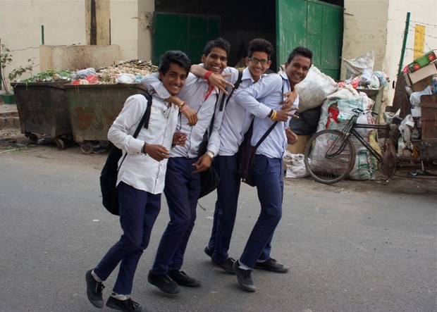 'Young men like to pose.' College age students in New Delhi.