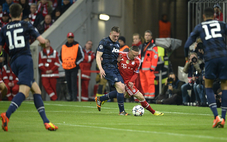 Bayern v United: Phil Jones and Franck Ribery'