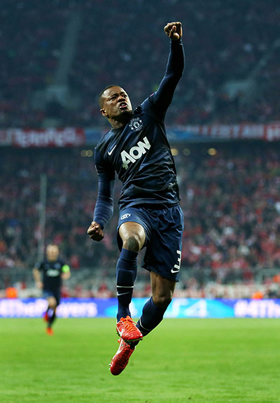 united lose to bayern: Patrice Evra celebrates