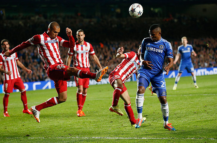 Tom's Chelsea pics: Miranda hacks the ball clear from Eto'o 