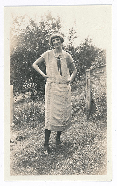 Girls Standing on Lawns: Woman on lawn