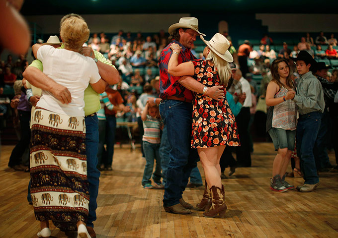 From the agencies: People dance to a band during the annual fiesta in Truth or Consequences