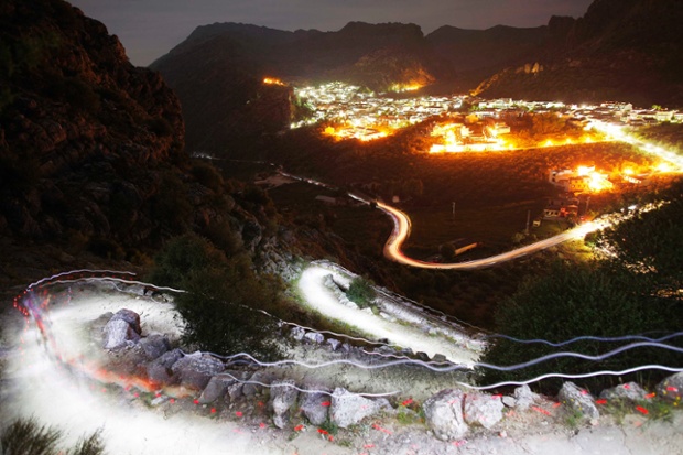 Light trails from runners's headlamps are seen during the 101km mountain race on the outskirts of Montejaque, southern Spain.