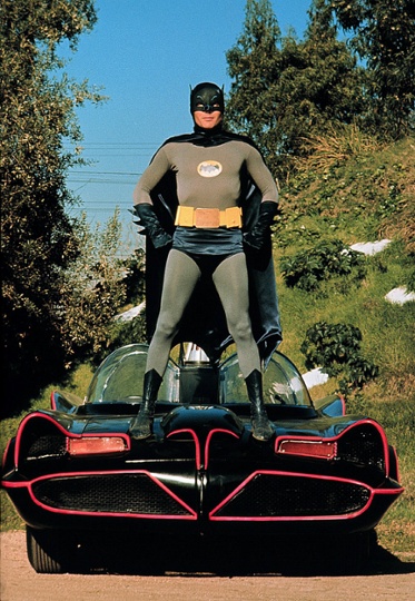 Adam West and the Batmobile from the 1966 film: Batman.