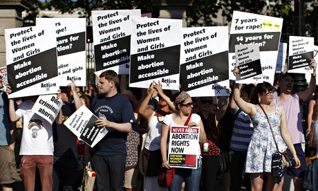Pro-Choice supporters hold placards