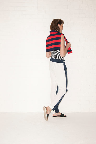 All Ages holiday: striped swimsuit white trousers with black stripe red black top sandals