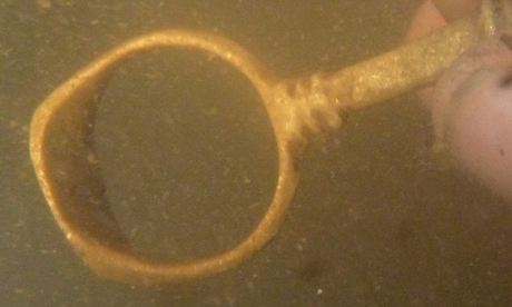 A combined signet ring and pipe-tamper recovered from the wreck of the London
