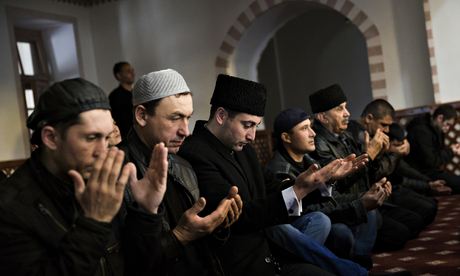 Tatar men pray in the Kebir-Dzhami mosque in Simferopol, Crimea