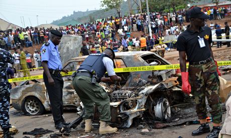 Nigerian security personnel inspect the