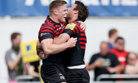 Saracens' Chris Ashton celebrates after scoring their third try.