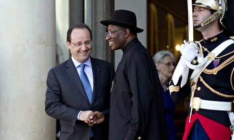 Nigeria's president Goodluck Jonathan and French president François Hollande leave the Élysée palace after the summit on Boko Haram. Photograph: Alain Jocard/AFP/Getty Images