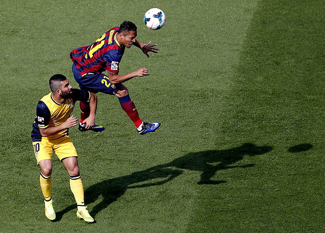 la liga: Adriano heads clear from Arda Turan