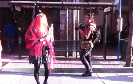 Taking photos on the streets of Athens.