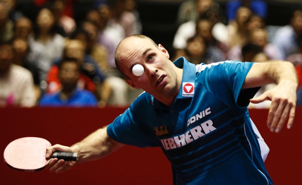 Austria's Daniel Habesohn eyes the ball as he serves to China's Ma Long during their men's quarter final match at the World Team Table Tennis Championships in Tokyo, Japan.