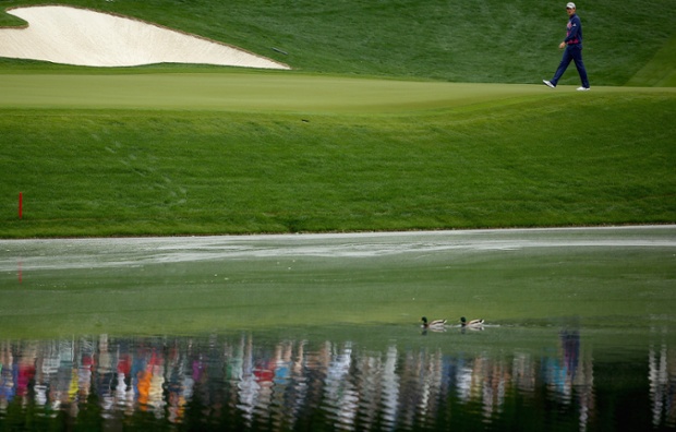 Justin Rose of England walks along the 14th green during the second round of the Wells Fargo Championship at Quail Hollow Club in Charlotte, North Carolina.