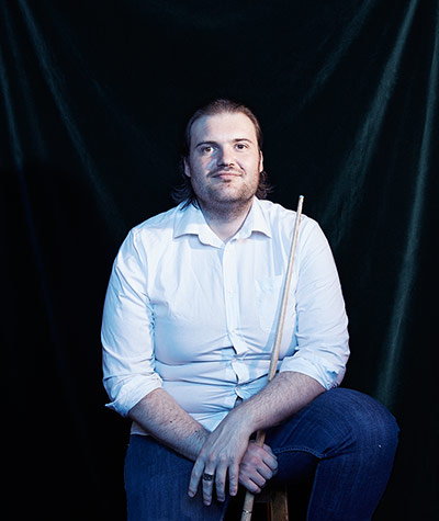 non voters - weekend : man in white shirt holding cue 
