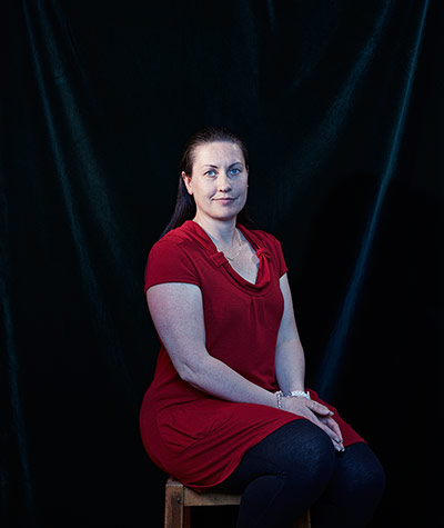 non voters - weekend : woman in red dress against black background