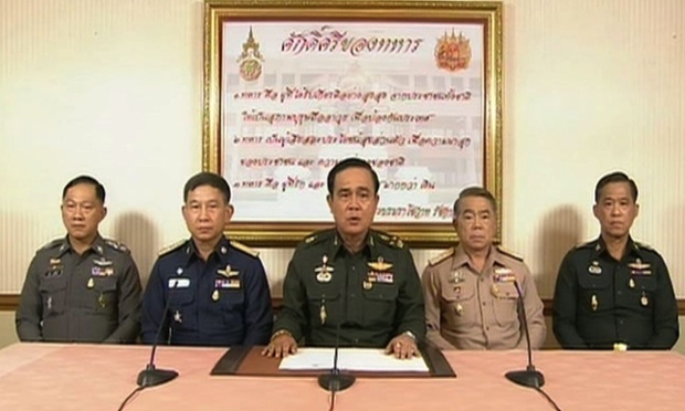 Thai takeover - A screengrab from a broadcast on Thai television showing Thailand's army chief Prayut Chan-O-Cha announcing in a televised address to the nation that the armed forces are seizing power.