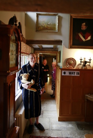 Lord Hannah of Pilcot stands in the hallway after casting his vote at his Grade II listed home near Fleet. Lord Hannah is usually the first to vote in his parish considering the polling station is in his living room.
