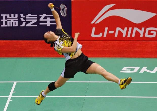 South Korea's Bae Yeon Ju returns a shot to China's Wang Shixian during their women's singles semi-final match in the Uber Cup badminton championship in New Delhi, India.