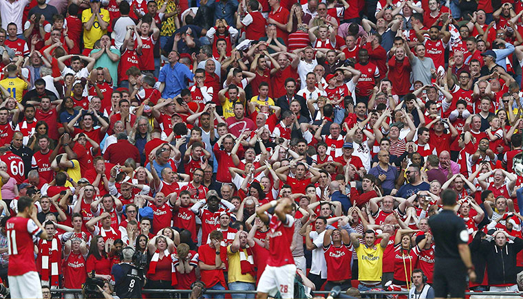 20 Photos: Arsenal fans after Kieran Gibbs missed a chance during the FA Cup final